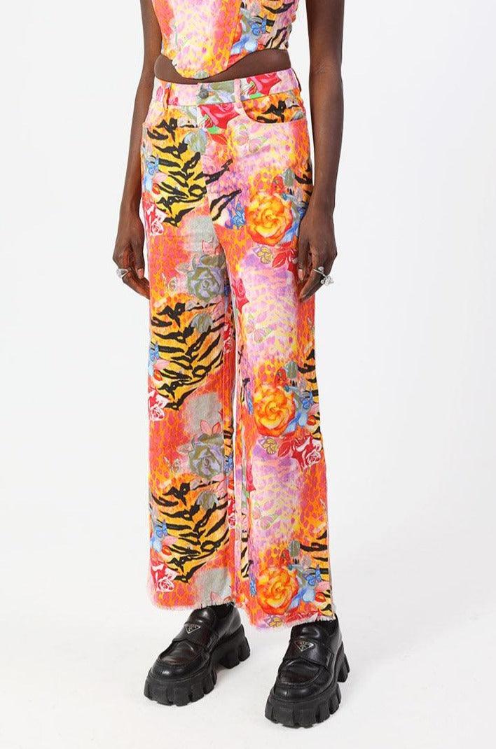 Y2K inspired tiger and rose print denim wide leg raw edge jeans