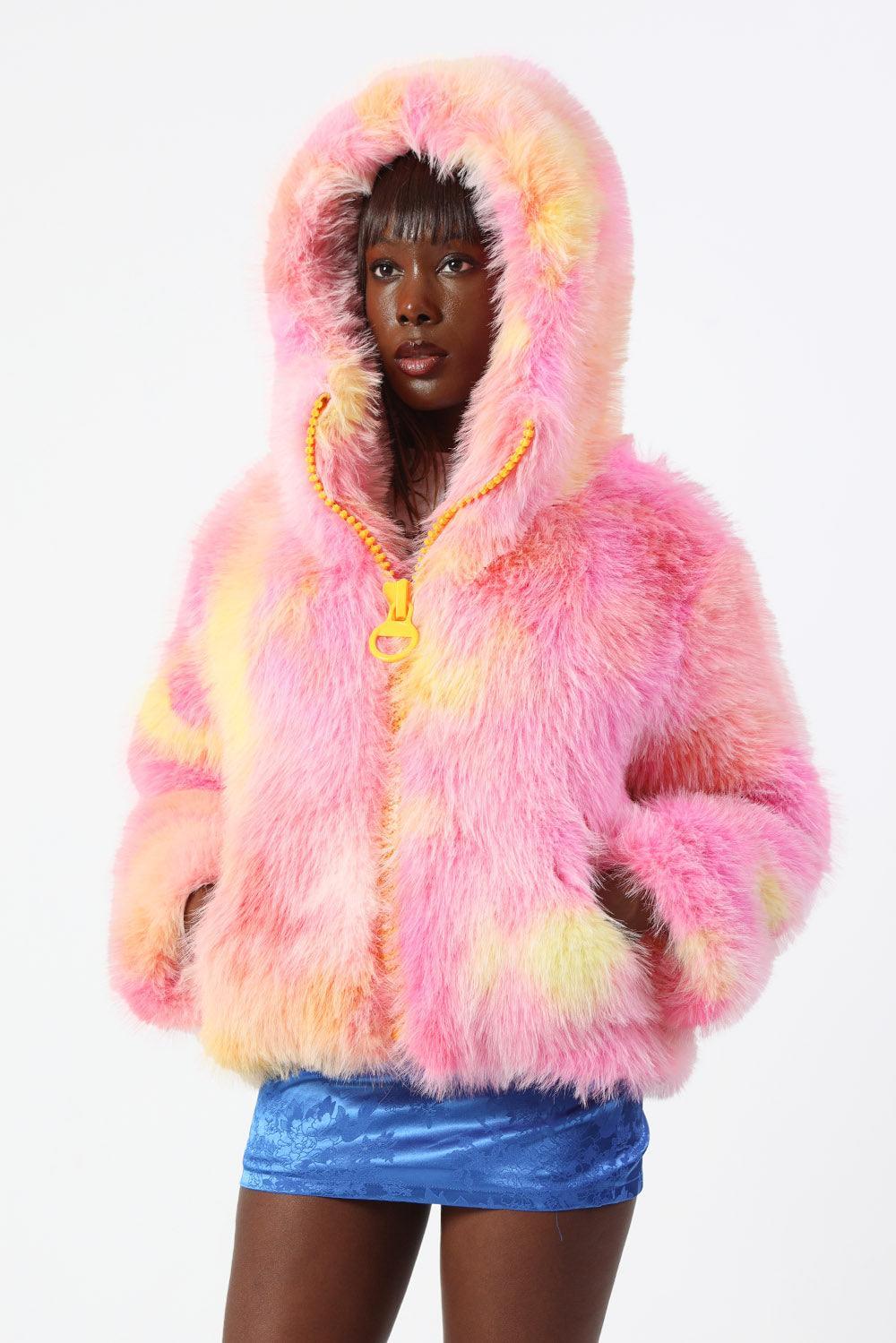 Hand dyed tie dye jacket with long hair in neon pink and orange with an oversized chunky pink zip and hood.